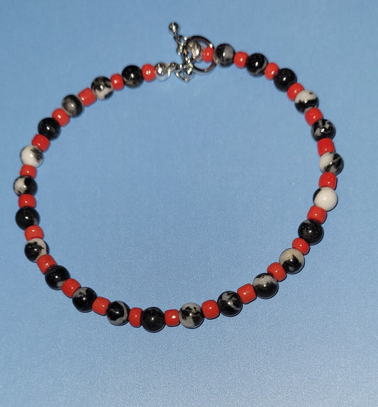 A1 Snowflake Obsidian with Red Beads